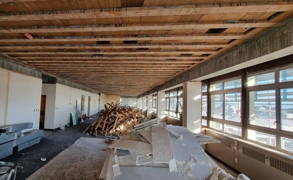 Asbestos ceiling removal in New Plymouth building. 