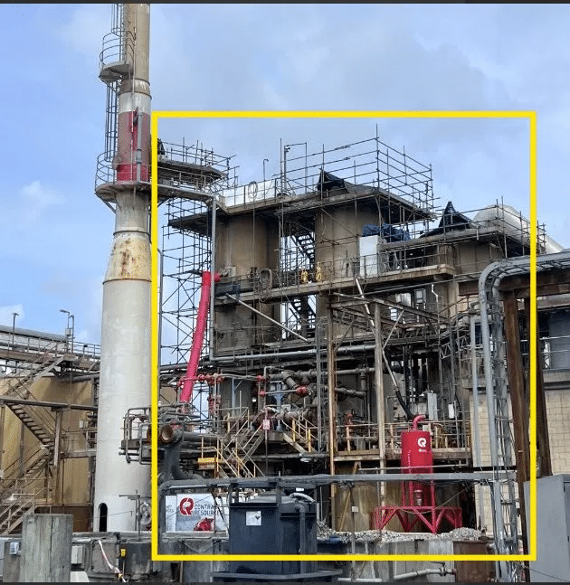Drying towers prepped with scaffolding prior to asbestos removal.