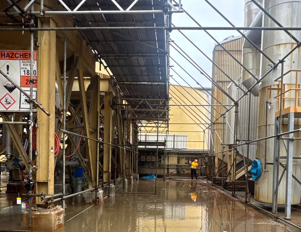 Scaffolding and containment structures at the Ballance facility during Class A asbestos removal works. 